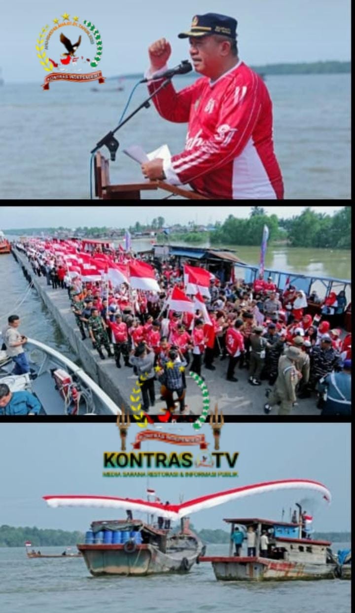 Bupati Asahan Kibarkan Bendera Merah Putih Raksasa di Muara Selat Malaka